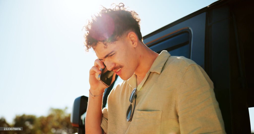 Stressed traveler making a phone call for help during vacation emergency